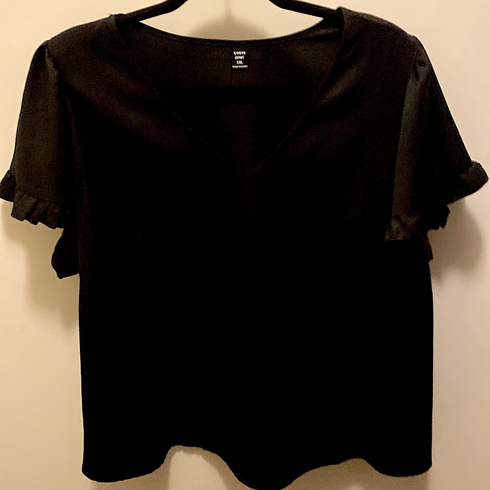 SHEIN black ruffle short sleeve blouse. Size 1X . NEVER WORN, but no tags.